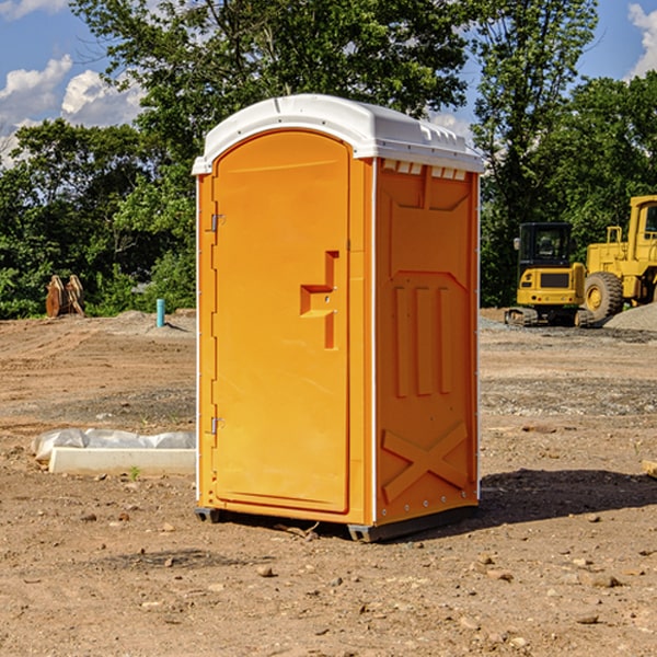 how often are the portable restrooms cleaned and serviced during a rental period in Scottsville